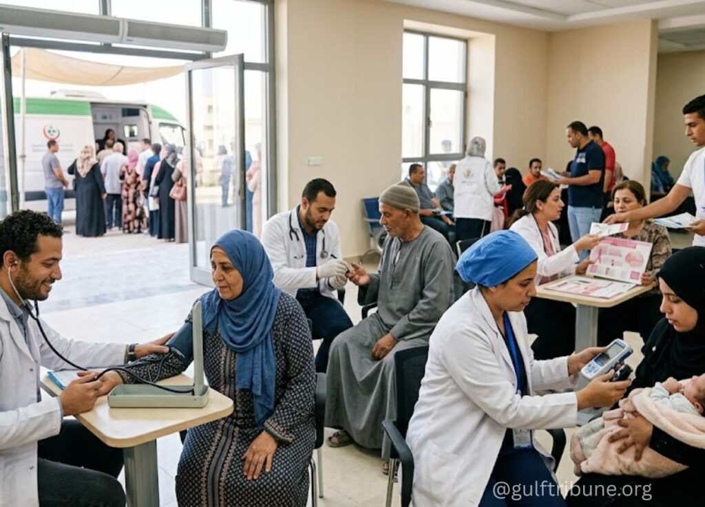 37 - Gulf Tribune Medical clinic scene with doctors attending patients; a male doctor checks a woman's blood pressure at a small desk near an open entrance with an ambulance outside.